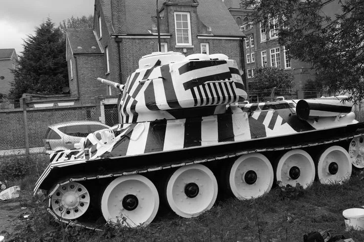 Angular architecture with dazzle-inspired striping